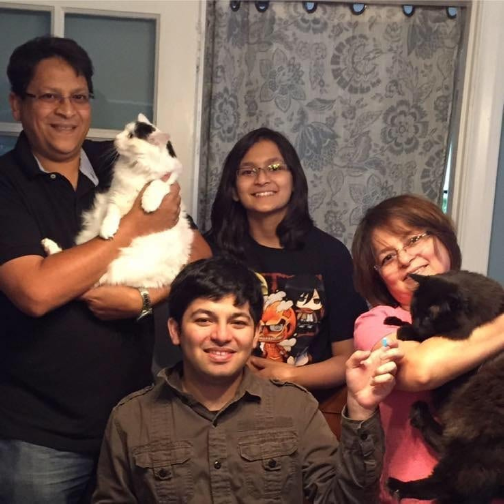 The Kamat Family and their cats