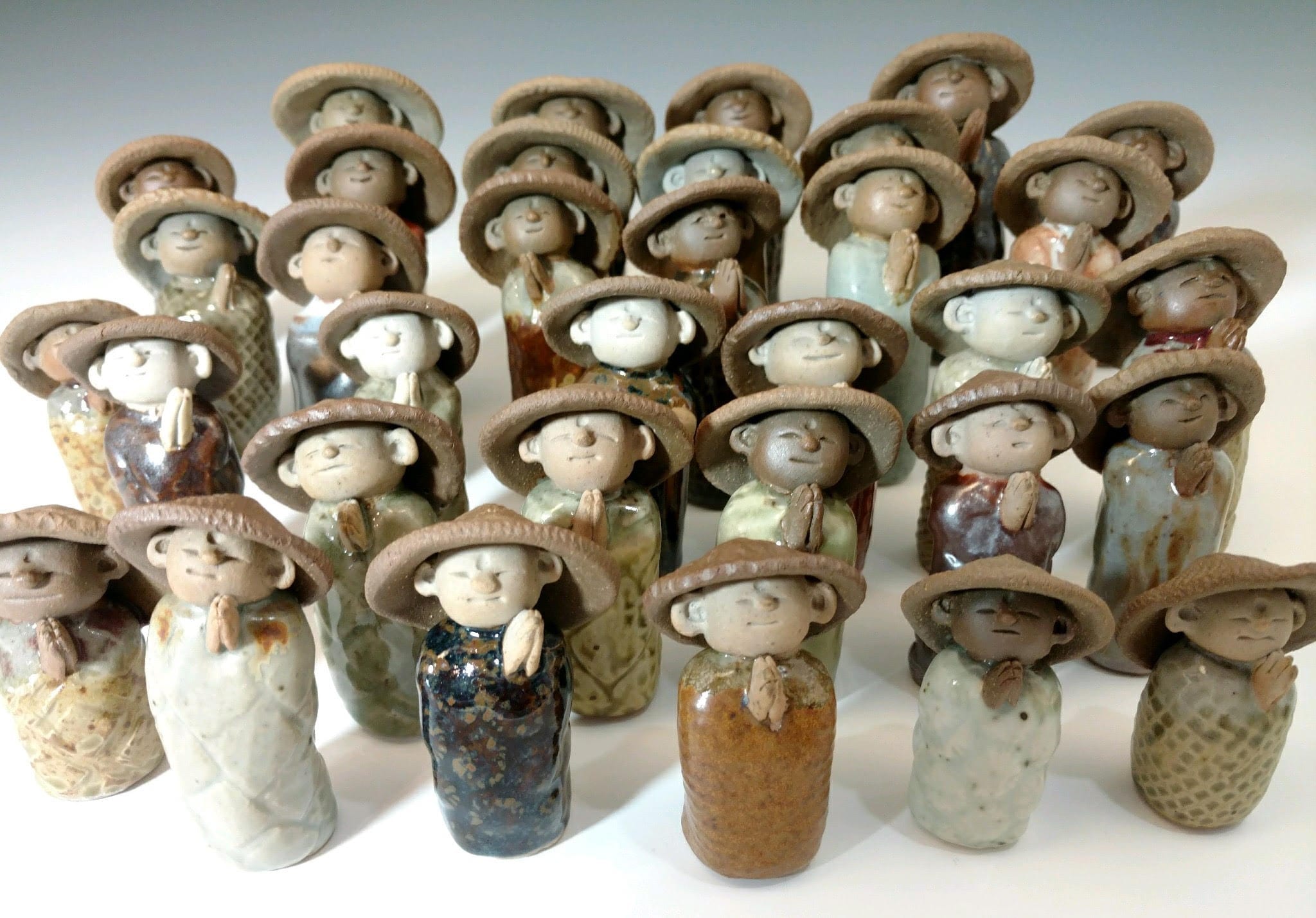 Ceramic statues made by Anne Maravigilia