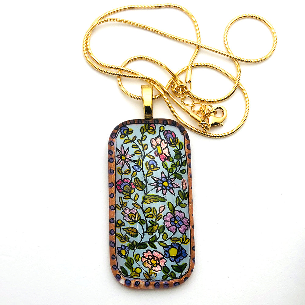 Floral vines pendant made by Sarita Kamat