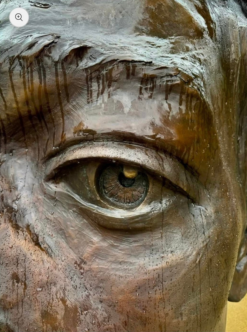 macro photograph of a statue's eye by Jeffery Garrett