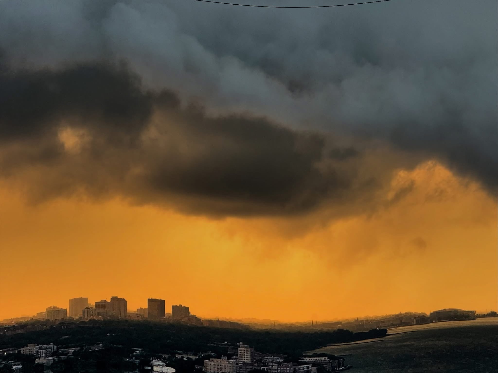 storm clouds of the city, a photograph by Jeffery Garrett
